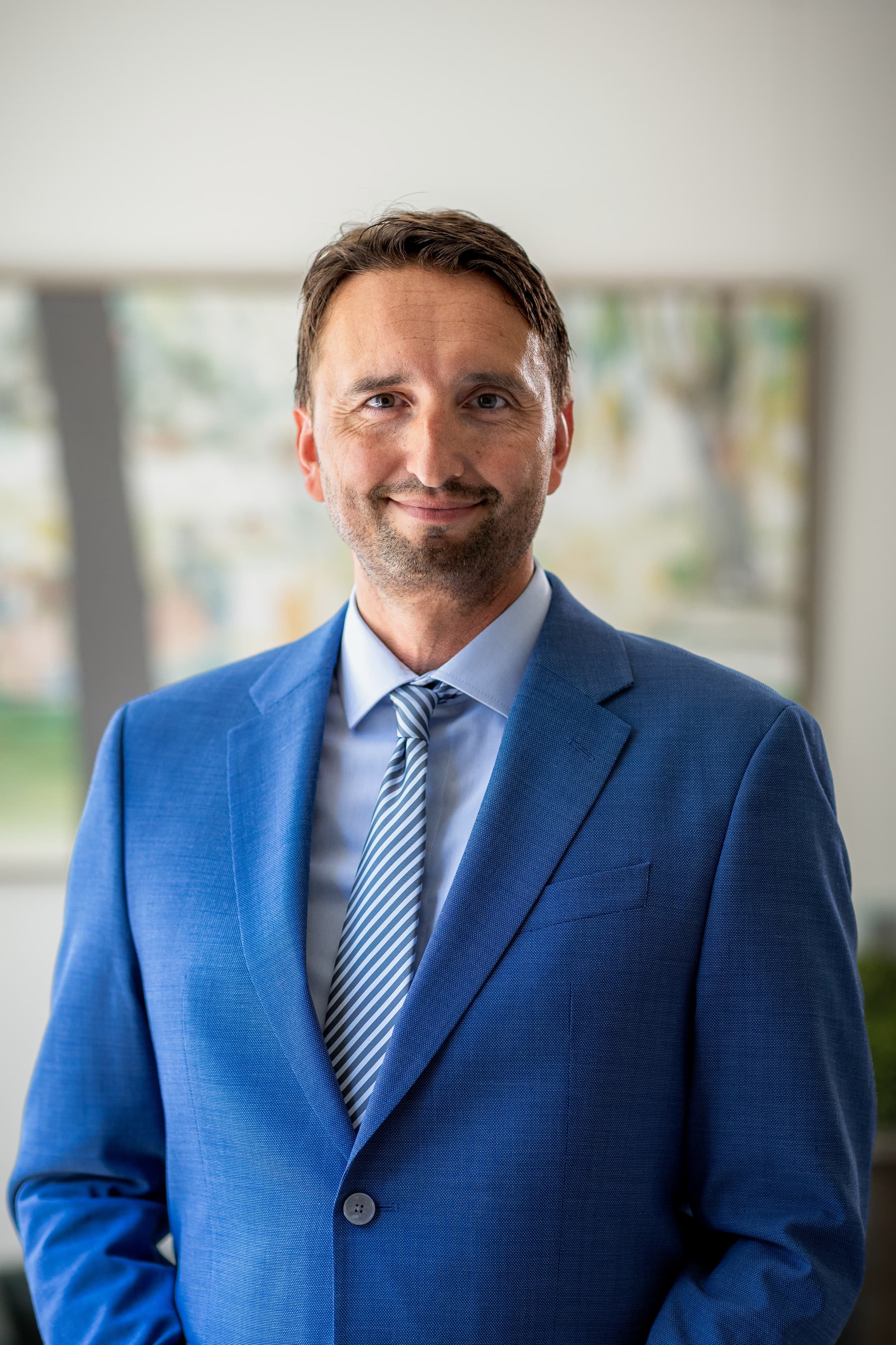 Dr. Adam Melski